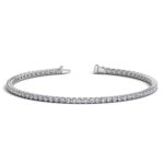 D21706454 1 Classic four prong 2 carat total weight diamond tennis bracelet showcasing perfectly matched brilliant round cut lab grown diamonds set in 14k white gold.