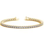 D26933646 1 Classic four prong 7 carat total weight diamond tennis bracelet showcasing perfectly matched brilliant round cut lab grown diamonds set in 14k yellow gold.
