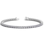 D28785133 1 Classic four prong 7 carat total weight diamond tennis bracelet showcasing perfectly matched brilliant round cut lab grown diamonds set in 14k white gold.