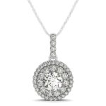 D62306505 1 Radiating, elegance, and sophistication this halo diamond pendant feature a 1/2 carat center diamond surrounded by smaller stunning diamonds. Crafted in 14k white gold.