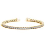D62436637 1 Classic four prong 6 carat total weight diamond tennis bracelet showcasing perfectly matched brilliant round cut lab grown diamonds set in 14k yellow gold.