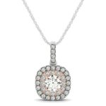 D67945265 1 Wonderfully captivating in 14k white and rose gold, this pendant features a 1/4 carat center round diamond surrounded by a double halo. The inner halo is in pink gold with the outer in white. Comes in a lovely cushion shape.