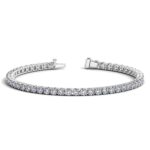 D7653366 1 Classic four prong 6 carat total weight diamond tennis bracelet showcasing perfectly matched brilliant round cut lab grown diamonds set in 14k white gold.