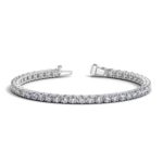 D90220575 1 Classic four prong 8 carat total weight diamond tennis bracelet showcasing perfectly matched brilliant round cut lab grown diamonds set in 14k white gold.