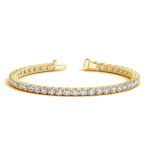 D9381223 1 Classic four prong 8 carat total weight diamond tennis bracelet showcasing perfectly matched brilliant round cut lab grown diamonds set in 14k yellow gold.
